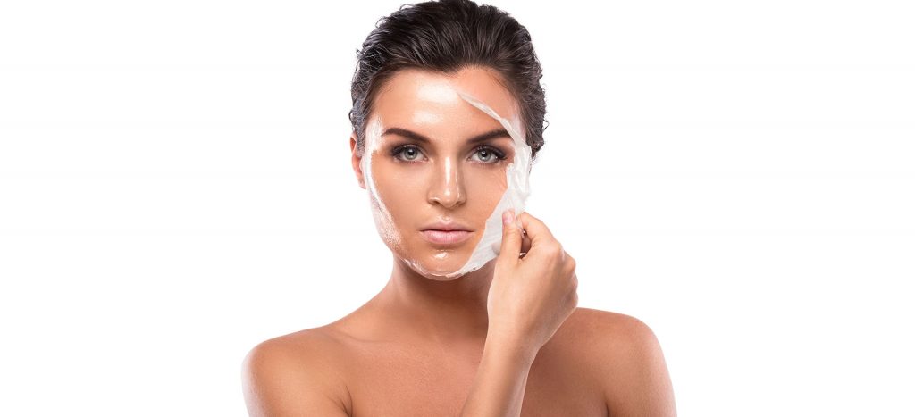 Girl peeling off face mask